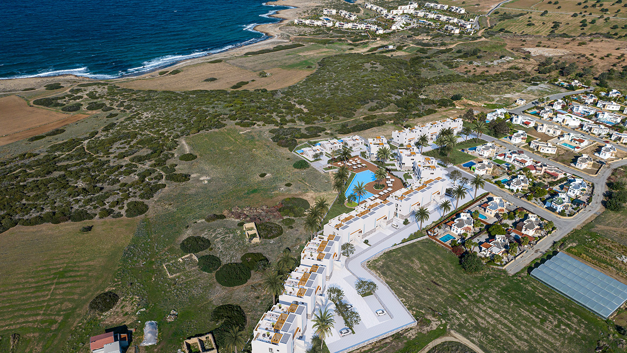 nordzypern-immobilien long beach, iskele - penthouse sky lounge - pool und garten (bild 7)